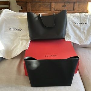 Large Classic leather tote with organizer insert, duster bags and gift box.